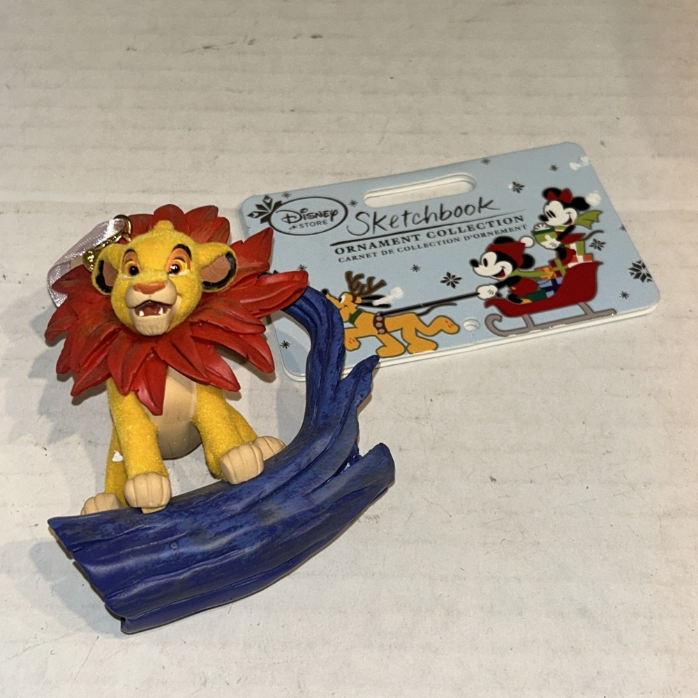 2015‎ Disney Store Lion King Flocked Simba on Log Sketchbook Christmas Ornament